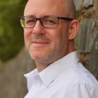 AbleGamers Team member A head and shoulders photo of Mark Burgess.