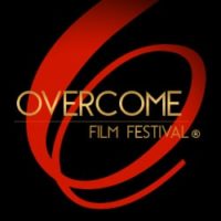 Overcome Film Festival Logo, black background with a red ribbon and OVERCOME FILM FESTIVAL in gold over the top