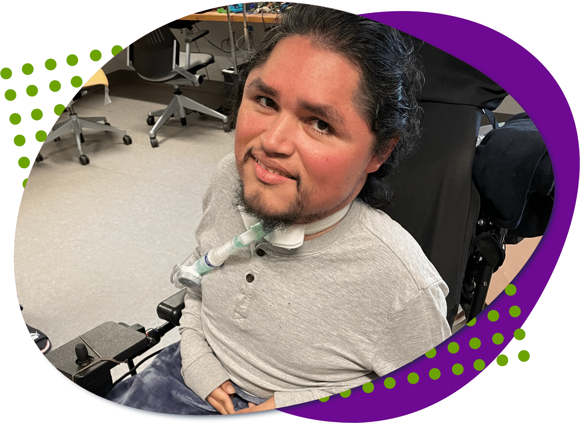 A photo of Carlos. He has dark hair and a beard. He is smiling.