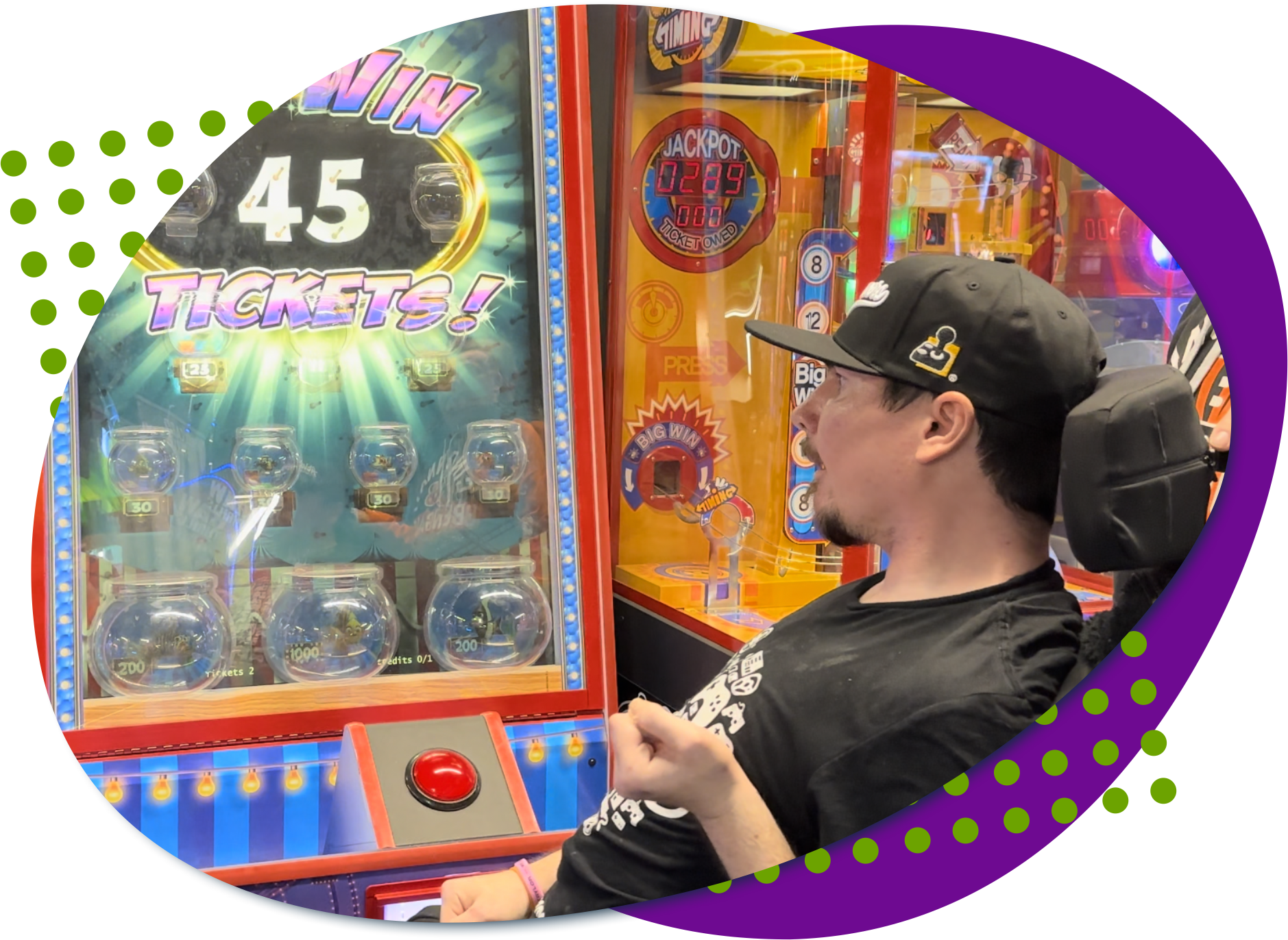 A player with disabilities playing an arcade machine.