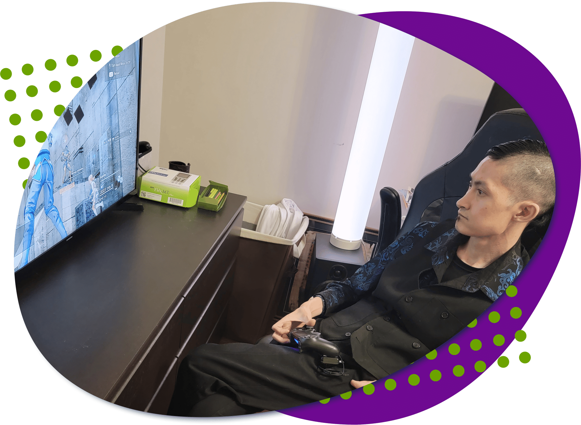 Eagle playing a video game with his custom controller.