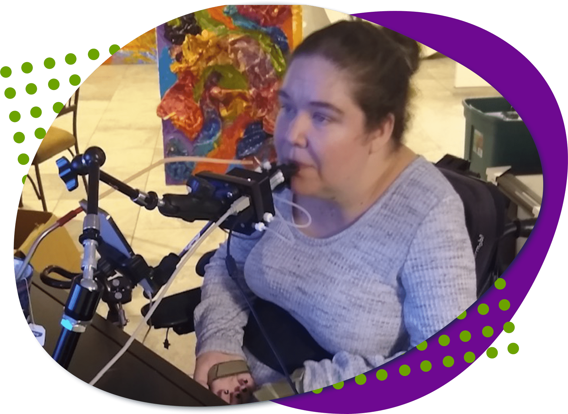 Jessica stack Jessica, a Caucasian female using a quadstick, a controller that you use your mouth with.