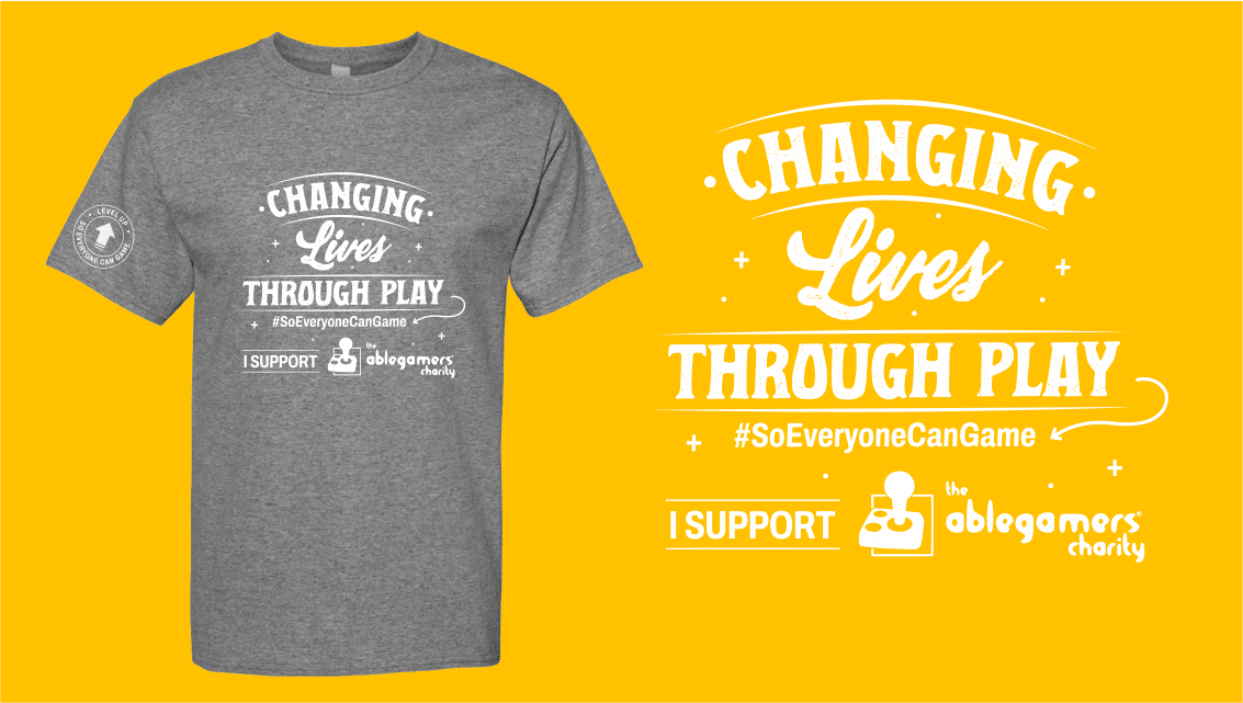 an image showing our "Changing Lives" short sleeve gray shirt with white imprint on front a sleeve and text that says 'Changing Lives Through Play, I support the AbleGamers Charity