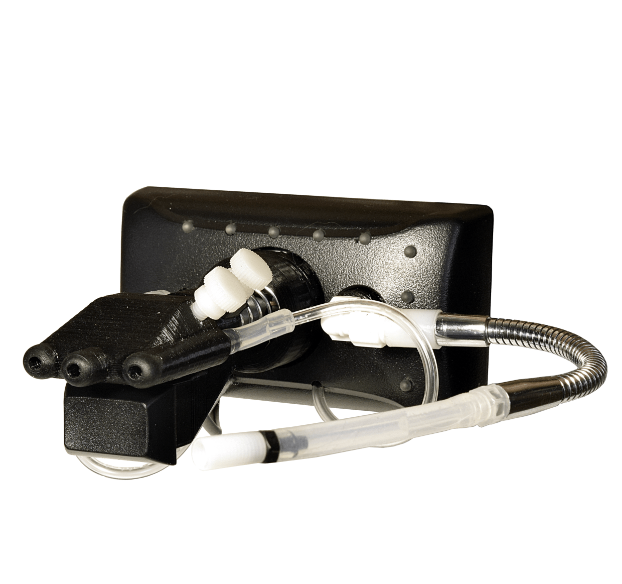 A closeup of the Quadstick Original. There are three sip n puff holes, a sip n puff straw, and a lip switch.