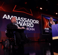 Steve Spohn on stage at GDC 2022 accepting his ambassador award